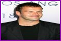 Jonny Lee Miller flashes ink for Ellen charity